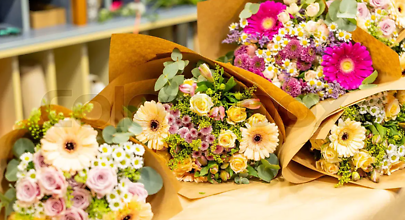 *Muskegon Wrapped Bouquet Starting At